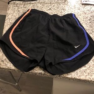 Black Nike shorts with multi color accent XS